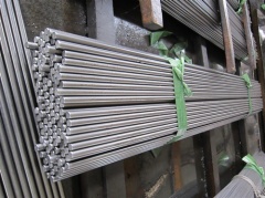 Free cutting steel round bar